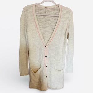 Free People knit cardigan in cream with bright pink trim stitching. Size Medium